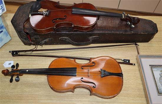 Two 20th century violins and two bows